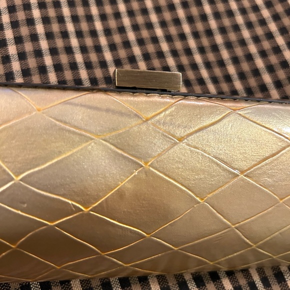 Used Kenneth Cole Reaction gold clutch. - Picture 2 of 6